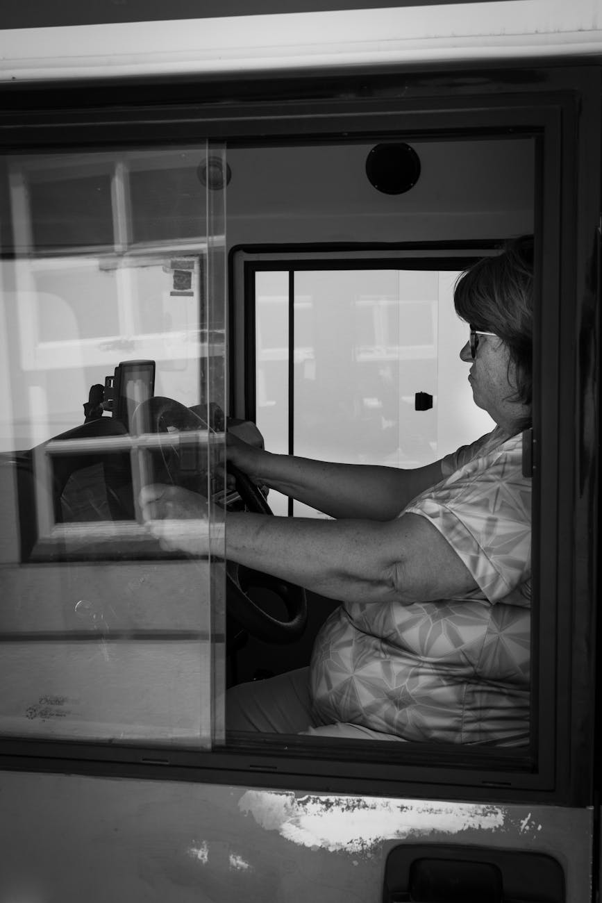 woman driving a tourist bus in faro portugal