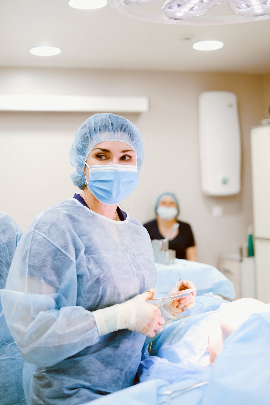 doctor in medical gown looking away